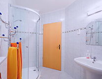 sink, indoor, plumbing fixture, shower, bathtub, tap, bathroom accessory, design, orange, toilet
